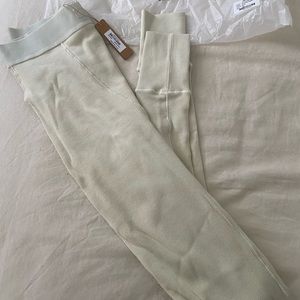 Cotton ribbed leggings by SKIMS in the color bone